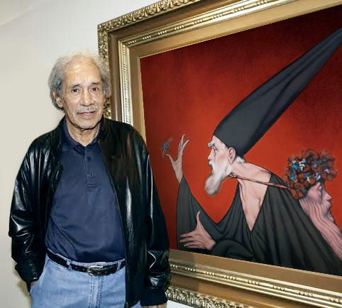El pintor Pedro Coronel junto a una de sus pinturas